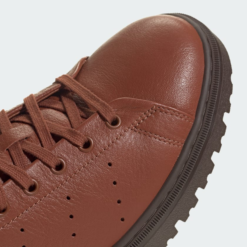 A close up crop of the toe box area of the Adidas Stan Smith Freizeit in brown