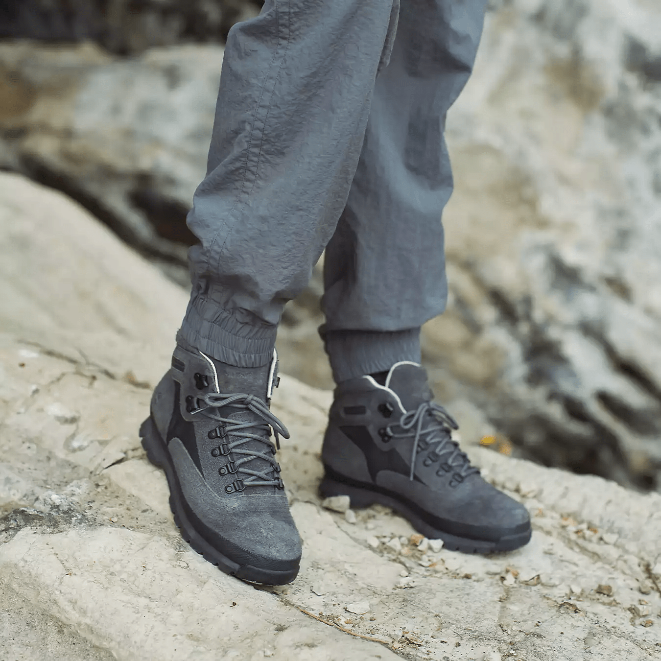 timberland x white mountaineering boots on rocks