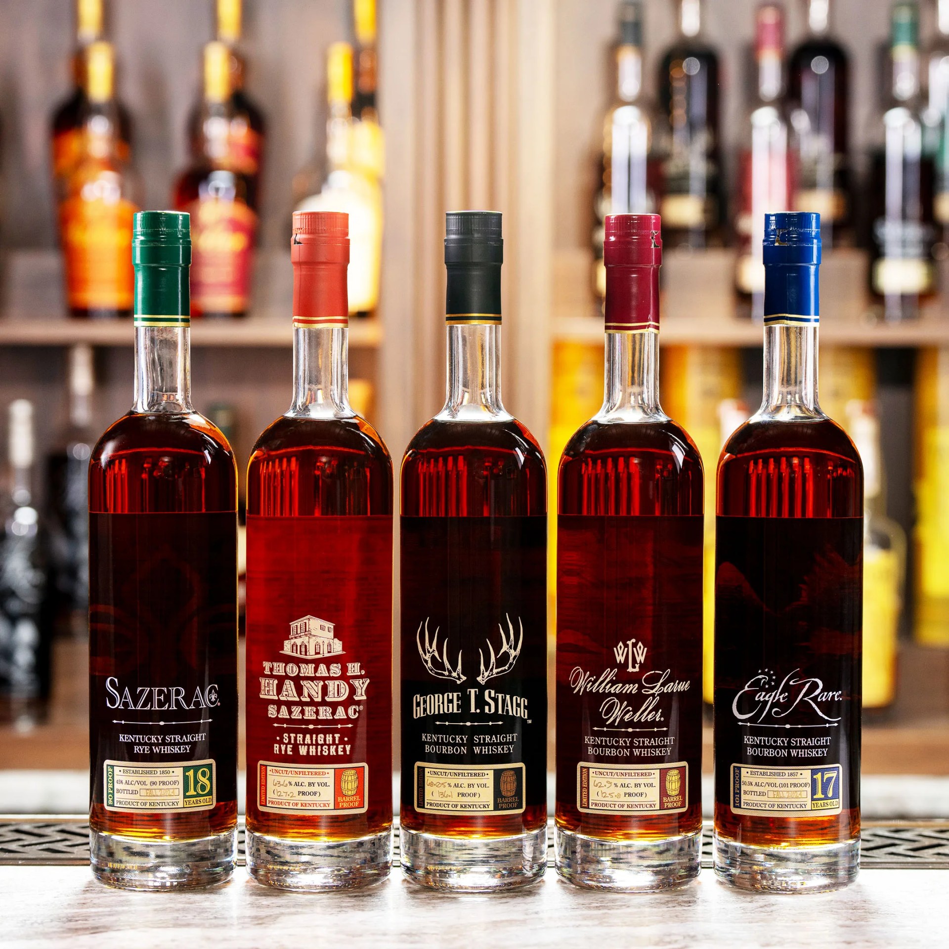 five bottles of buffalo trace whiskey on a bar