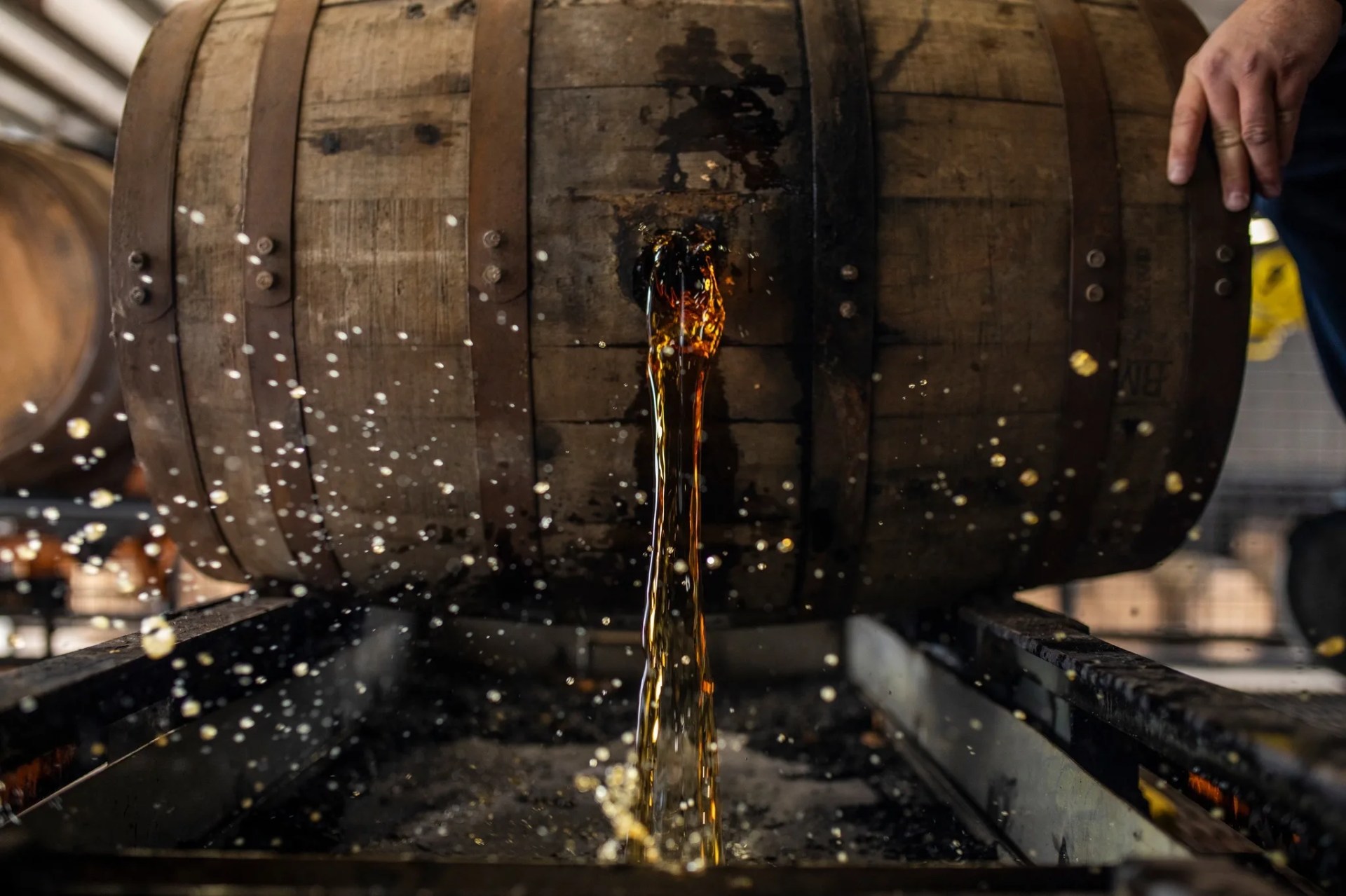 bourbon barrel being emptied