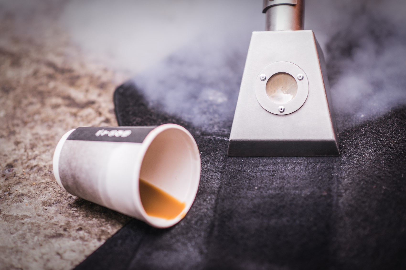 steam cleaner and coffee spill on carpet