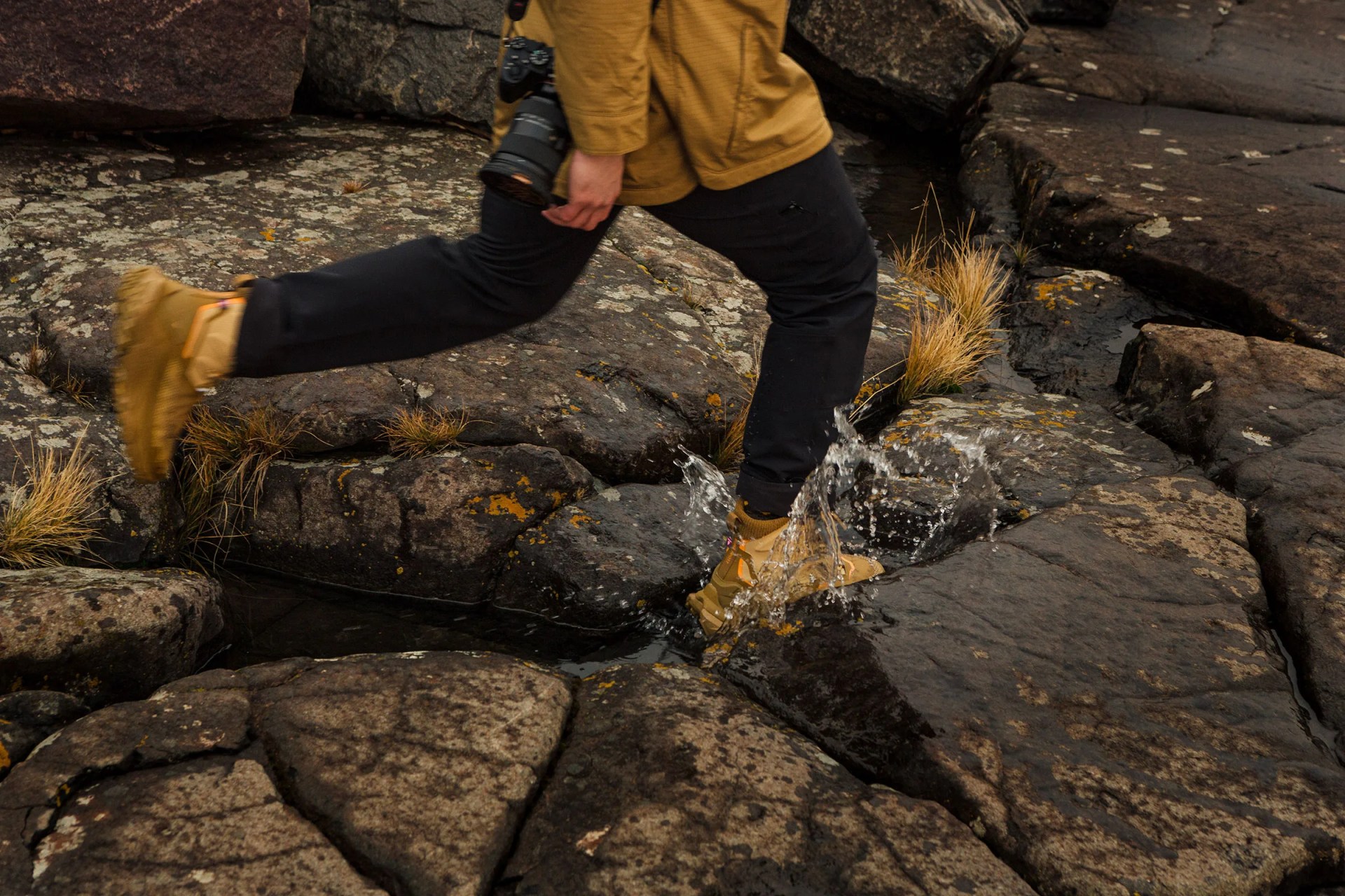 Hoka Kaha 2 Frost GTX stepping in a puddle 